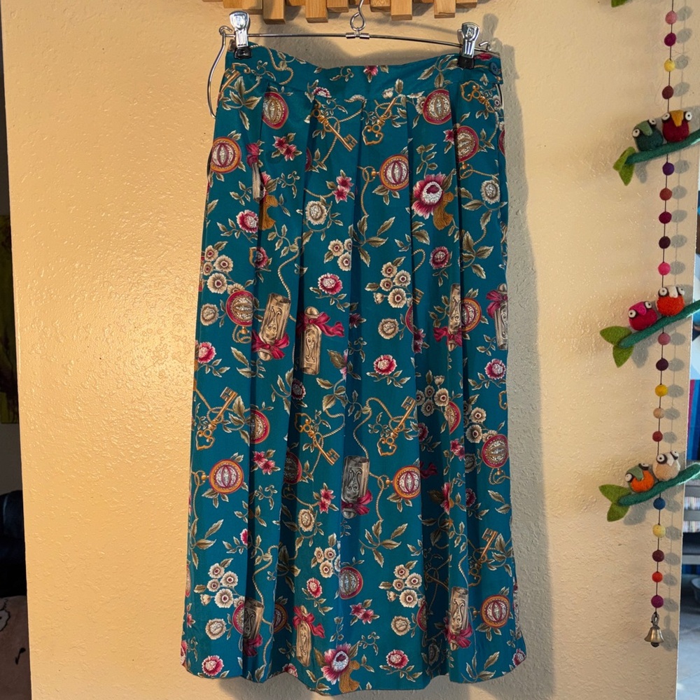 VINTAGE EUC SOI YONG SKIRT. Beautiful teal color with ribbons, perfume bottles,